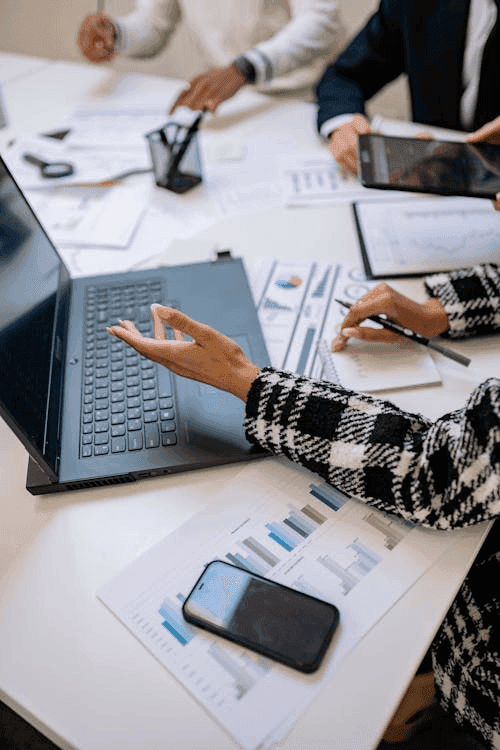 Business meeting with data reports